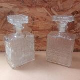 Pair of molded glass whiskey liqueur carafes + vintage stoppers