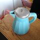 Vintage pitcher in blue ceramic and metal pourer