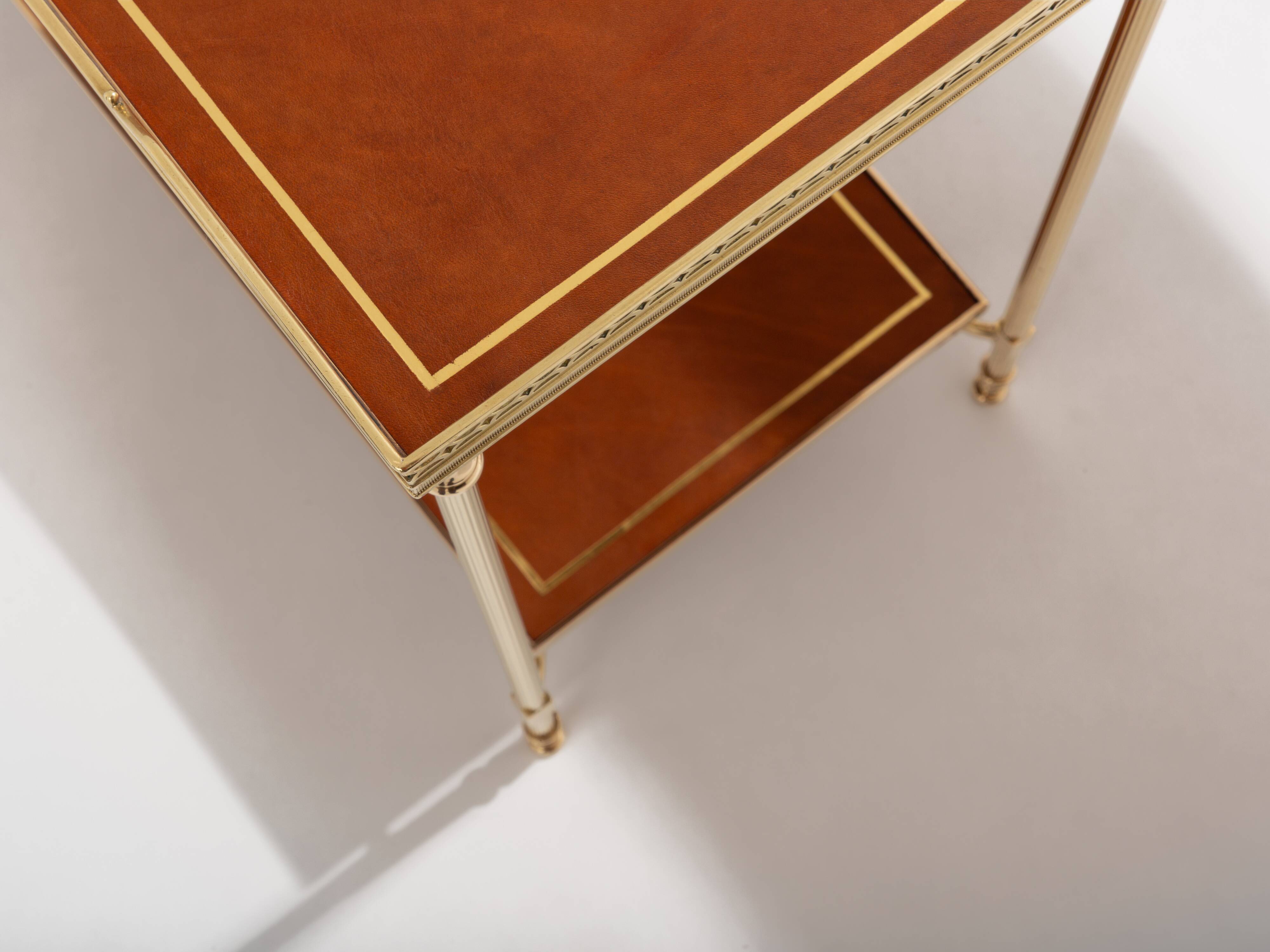 Pair of neoclassical brass and leather side tables by Maison Jansen, 1960