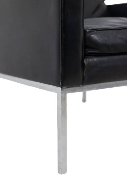 Pair of armchairs in black leather and chrome metal. 1970s.