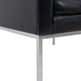 Pair of armchairs in black leather and chrome metal. 1970s.