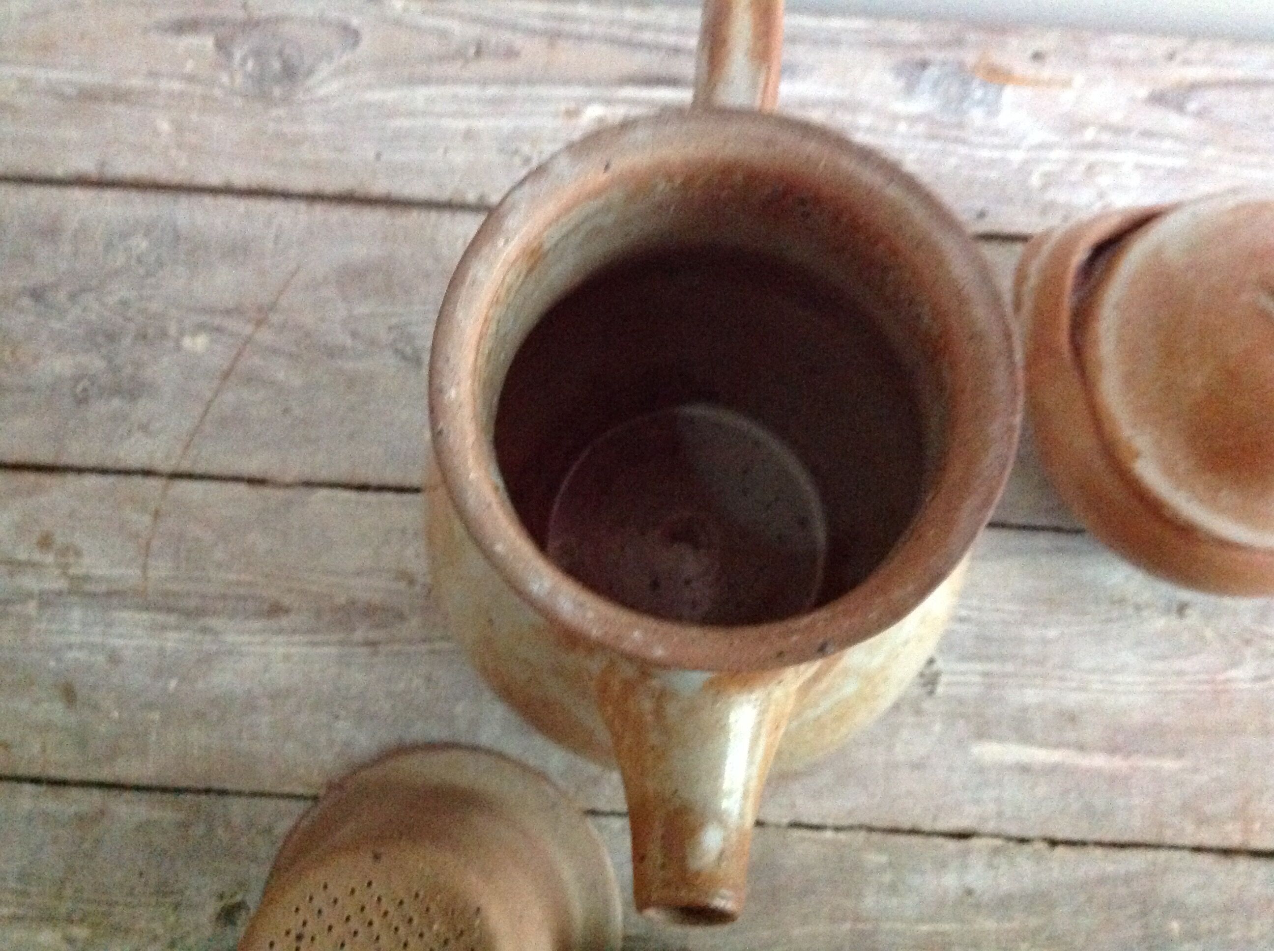 Teapot in reeds and its sugar bowl