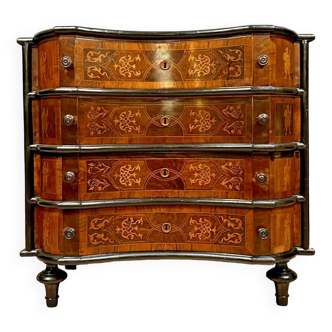 Baroque Louis XV period chest of drawers in blackened wood and marquetry circa 1750