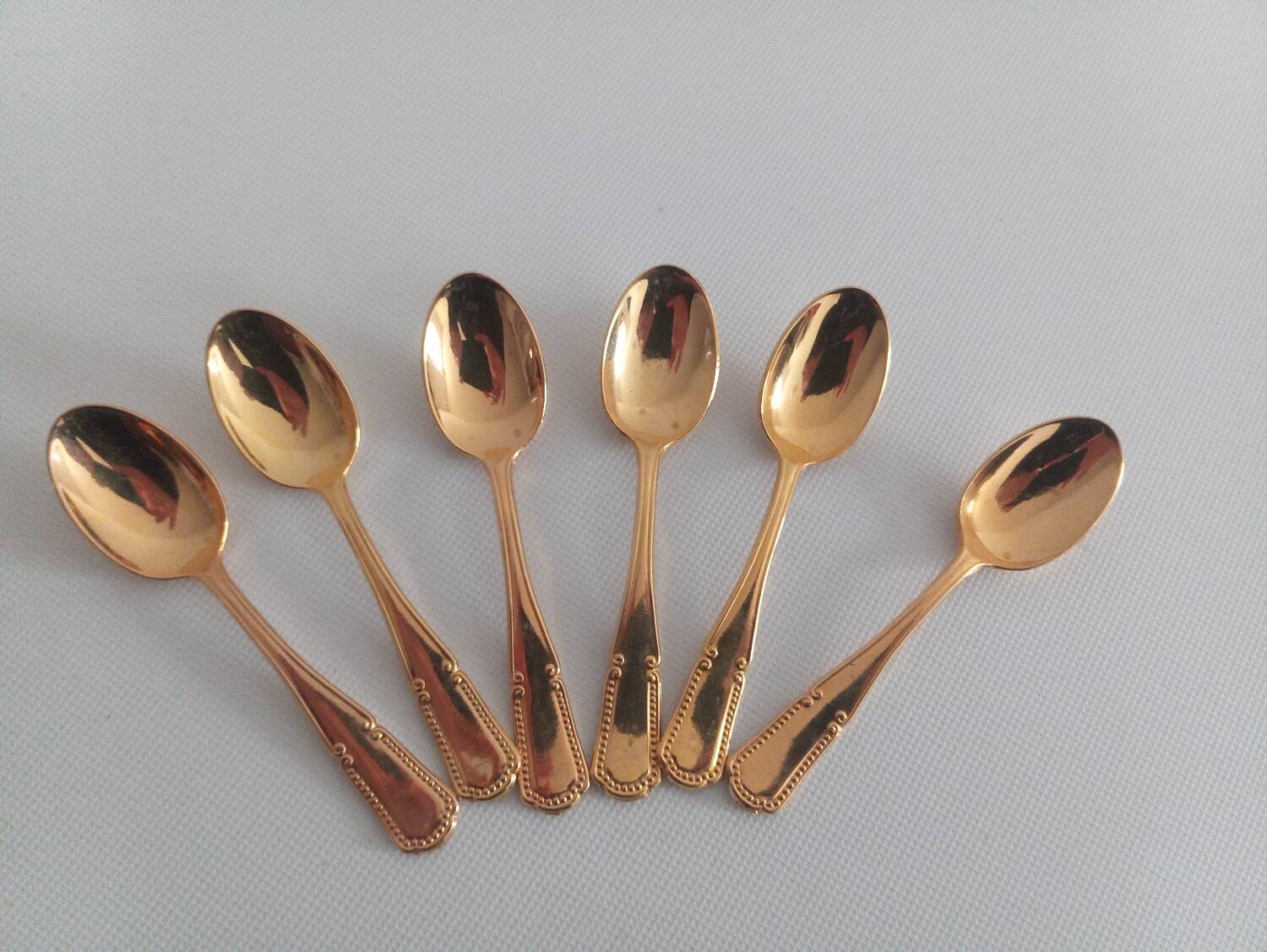 Gold coffee spoons and hallmark