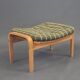 Pair of armchairs and a stool designed by Alf Svensson and manufactured by Källemo