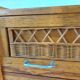 Commode vintage pieds compas en bois massif et osier