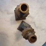 Pair of bronze dolphin candlesticks