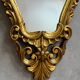 Antique golden cornucopia mirror from the 1950s, France.