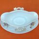 Sauce boat on dormant white porcelain, floral decoration