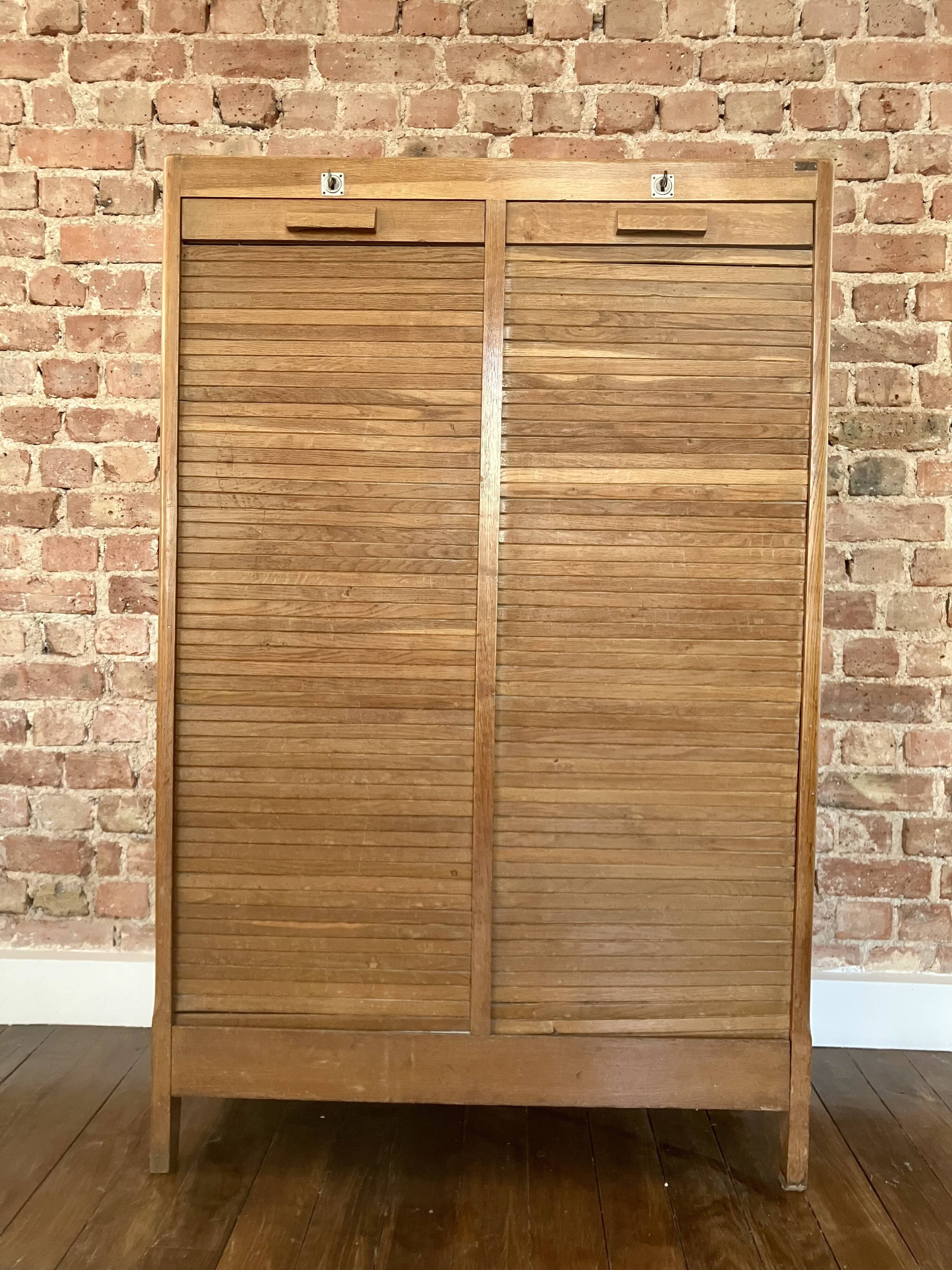 Double curtain filing cabinet in oak — on legs