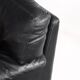 Black leather two-seater sofa. Roche Bobois edition. France, 1980s.