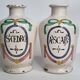Pair of antique apothecary pots in glazed ceramic, decorated by hand
