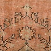 Tapis vintage rose poudré fait main en laine, style oriental doux