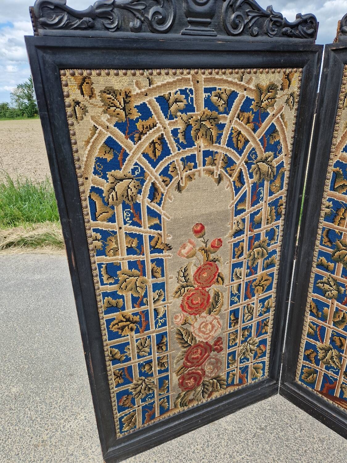 Folding screen in black-painted wood, 19th century