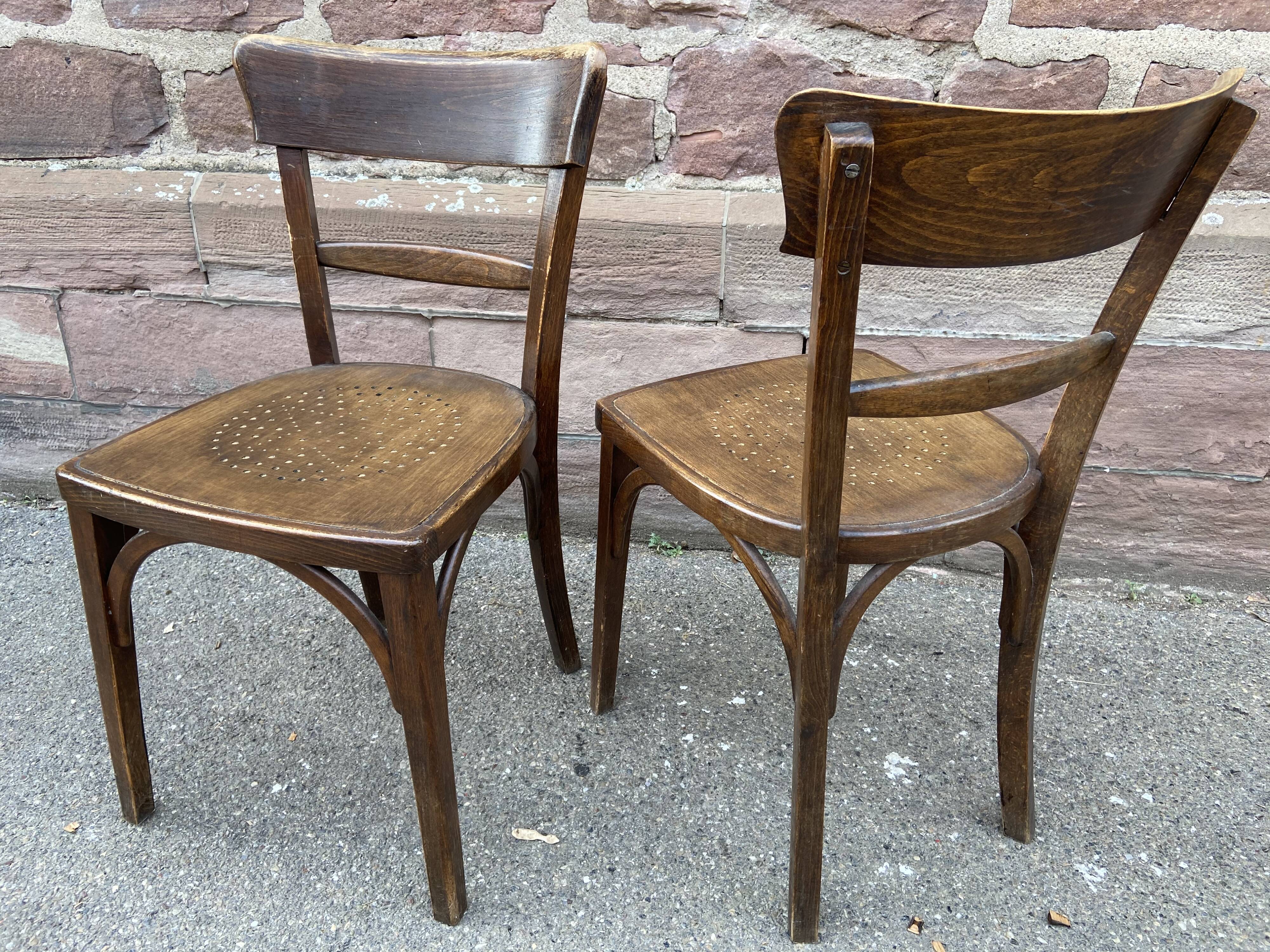 Pair of curved wooden brasserie chair