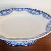 Antique compote dish with blue floral decoration.