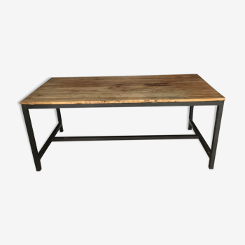 Metal table and raw wood