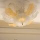 Chandelier/plafonnier vintage en Murano avec 16 feuilles blanches et ambrées.