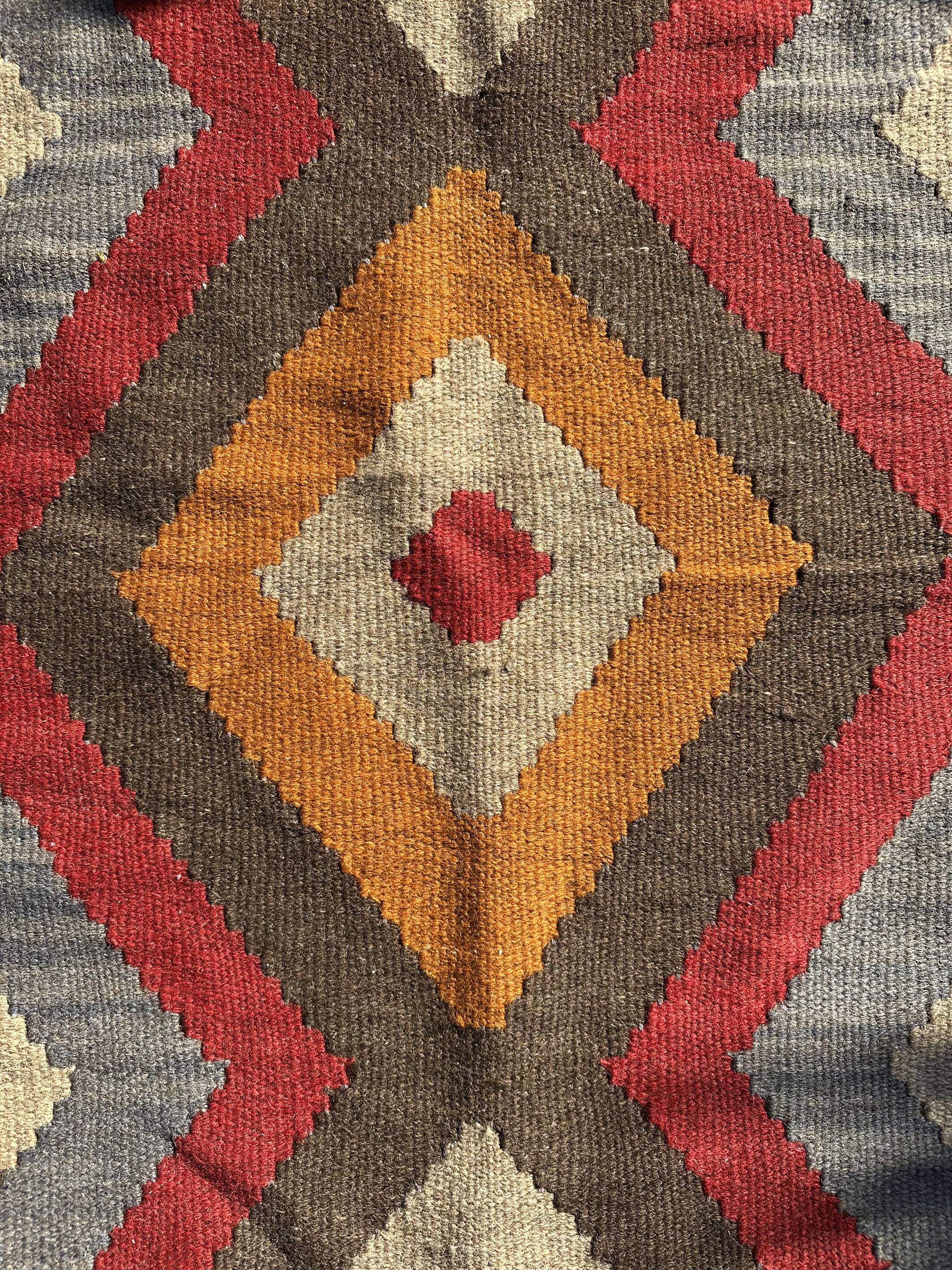 Multicoloured handmade wool kilim rug. Turkey, 1970s.