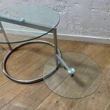Glass coffee table with 2 swivel tops