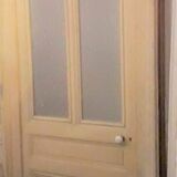 Large glazed door and its old glazed transom.