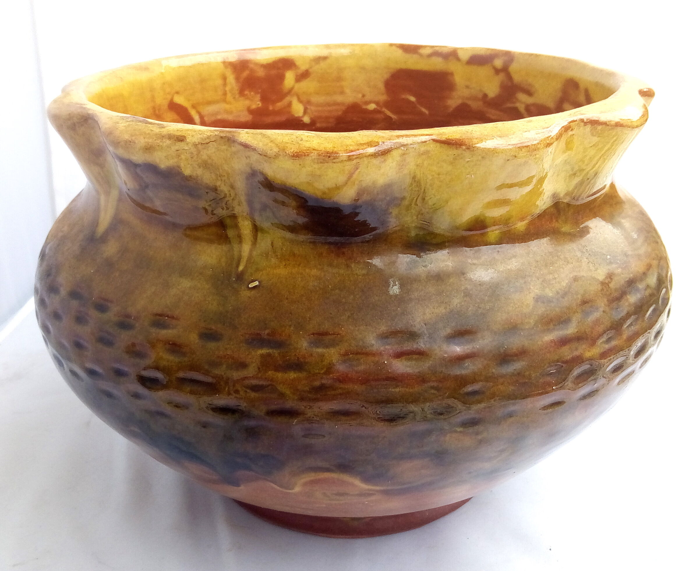 Rustic pot in brown and ochre enamelled earth