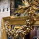 Monumental mirror Napoleon III in gilded wood with the profile of Apollo