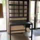 Postal sorting desk with a sliding top part back and forth.