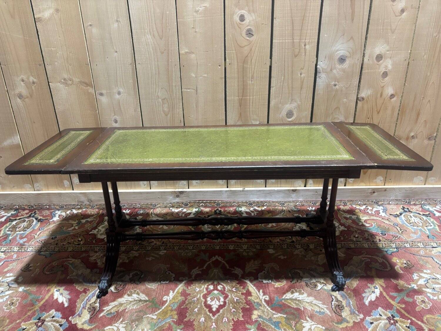 English Regency coffee table, mahogany & green stamped leather with gold.