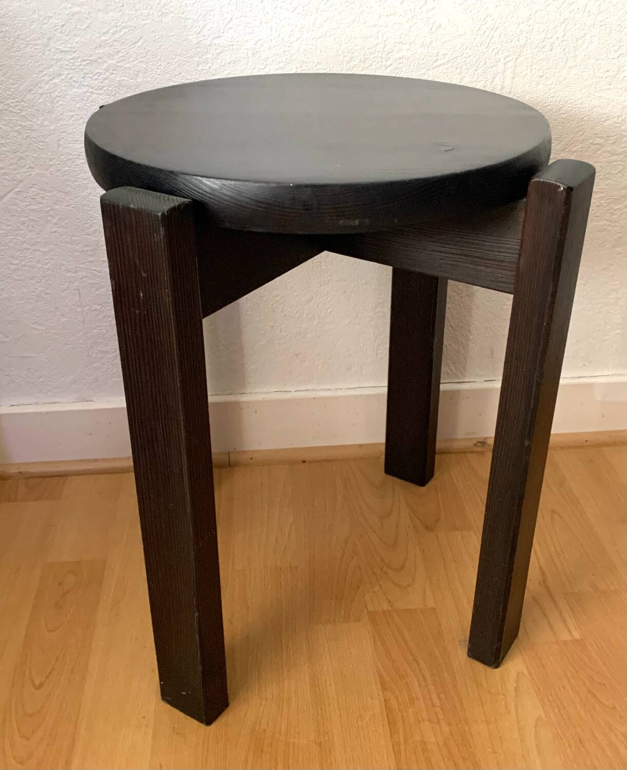 Black lacquered wooden stool