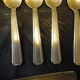 11 silver spoons with punches