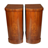 Pair of ceremonial furniture at pedestal support height functions as libraries