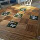 Round dining table Audoux Minet with 4 chairs and 2 armchairs.