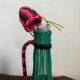 Old glass bottle and scoubidou