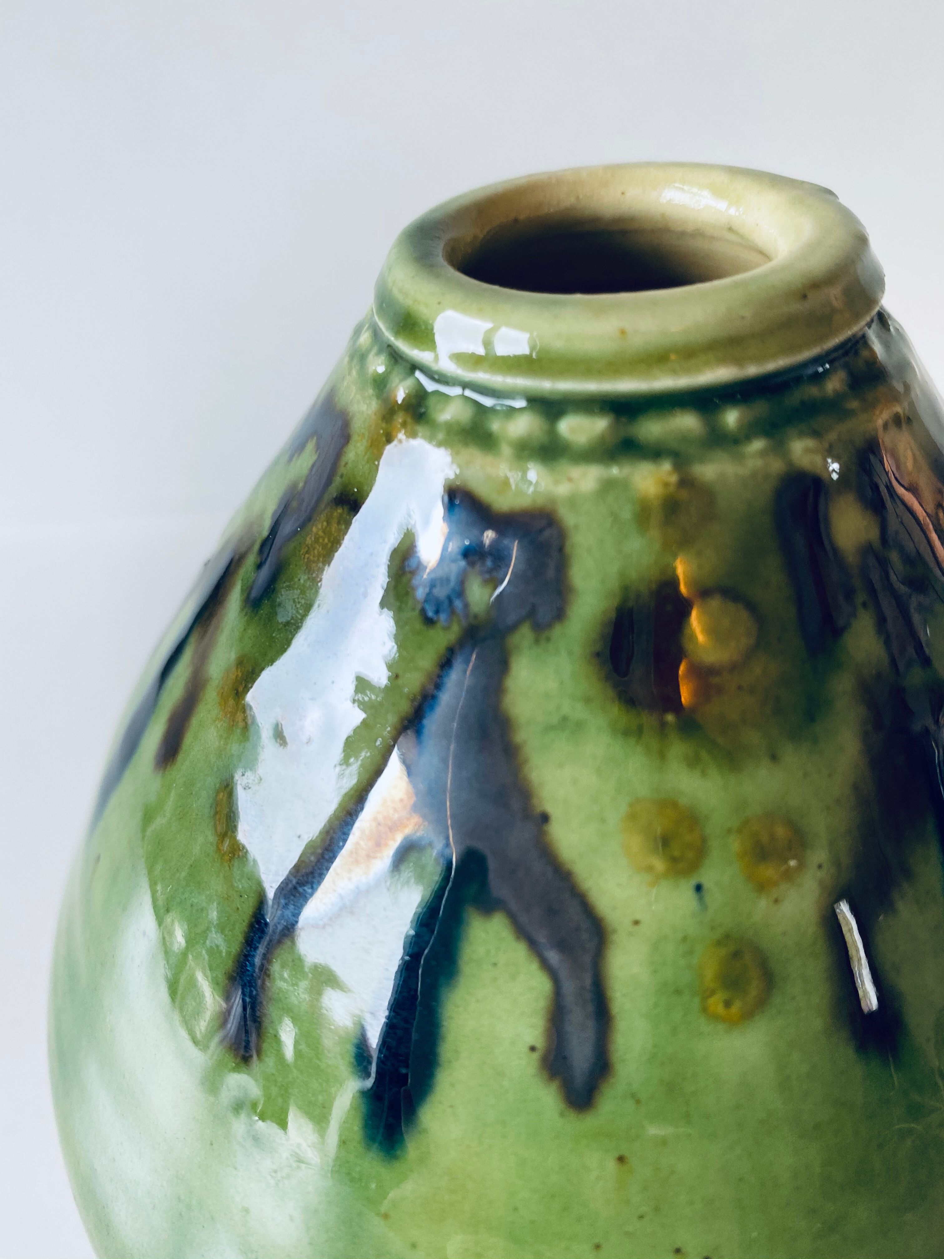 Signed ceramic green vase