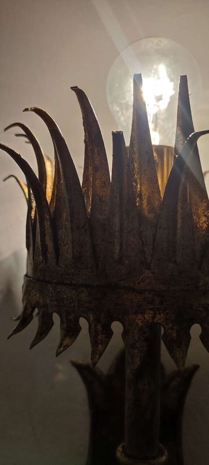 Wrought iron and gold leaf wall light. Spain, 1950s.