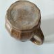 Handcrafted green and brown glazed ceramic pitcher, 1960s-70s