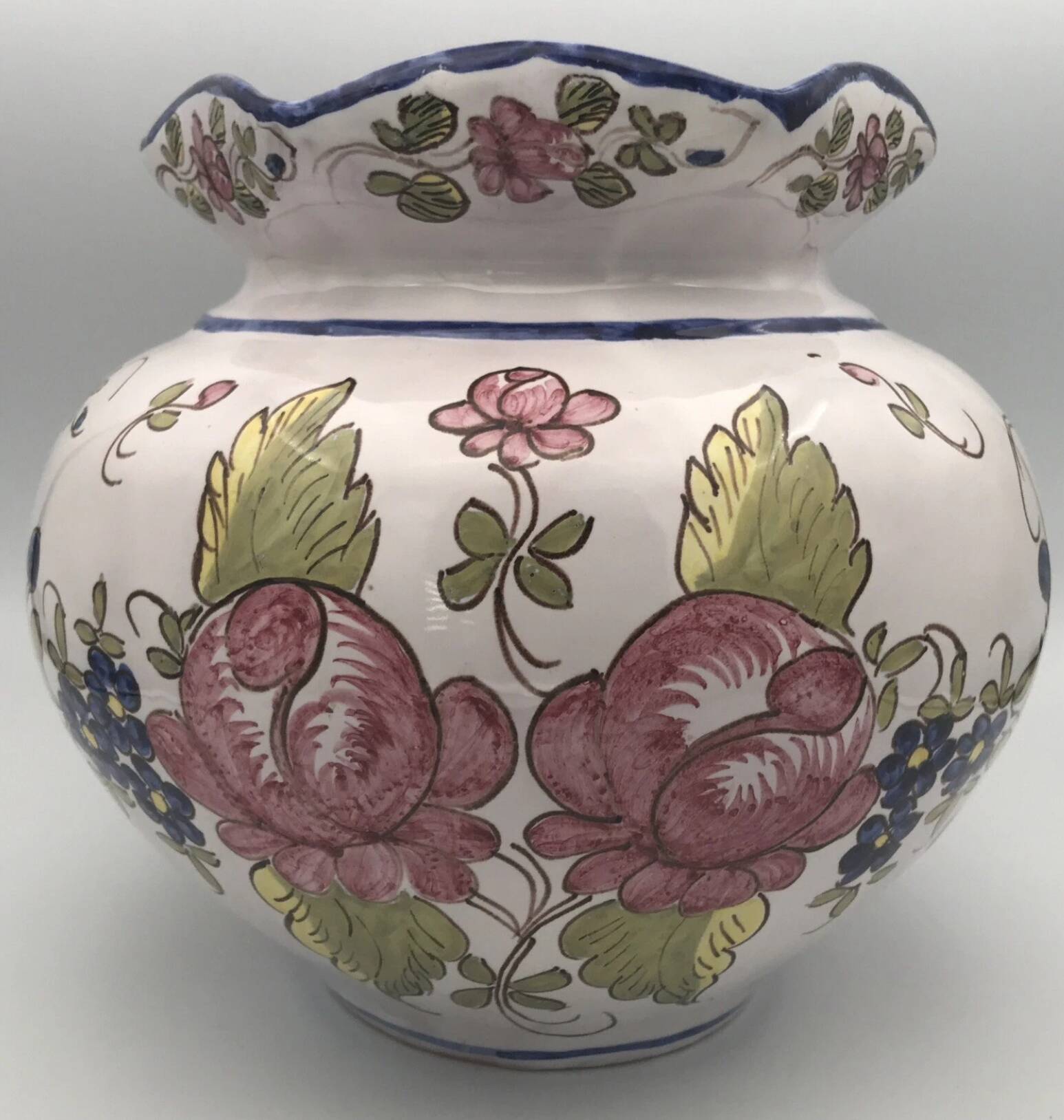 Round earthenware vase with polychrome floral motifs, signed