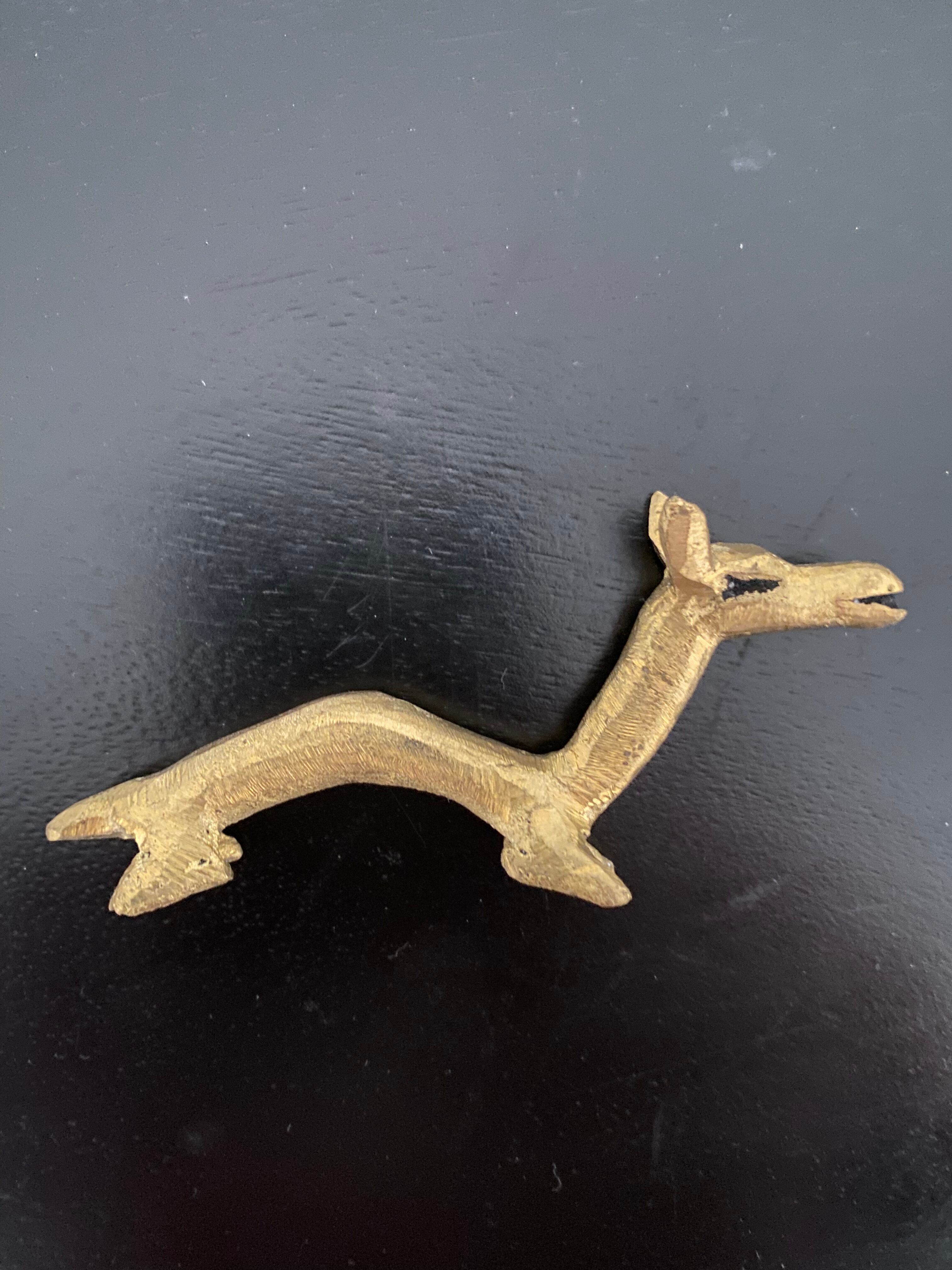 6 brass dromedary-shaped knife holders
