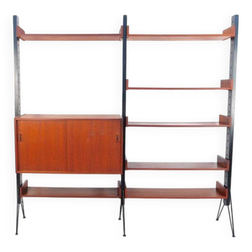 Vintage teak shelving system in 60s-70s style, retro style.