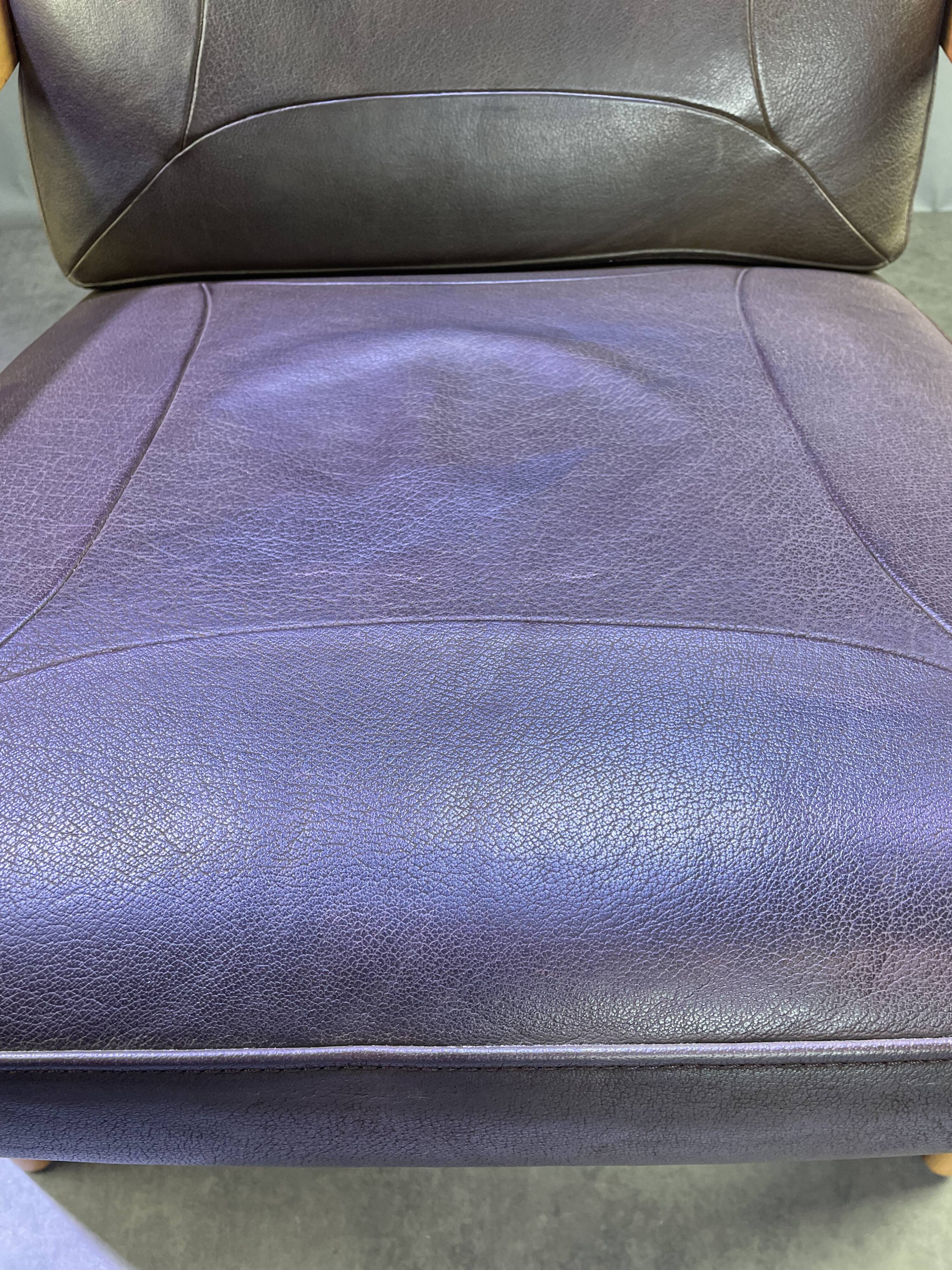 Chocolate leather armchair, wooden structure