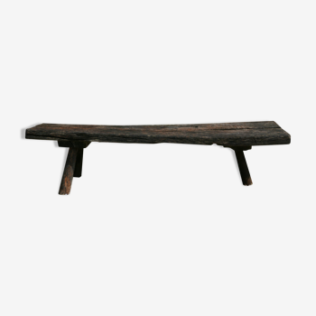 Former brutalist farm bench in solid wood