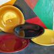 Four multicolored soup plates from the 1950s