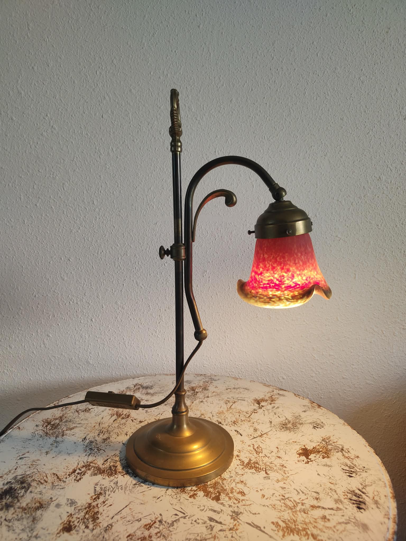 Brass articulated lamp with glass paste signed art of France.