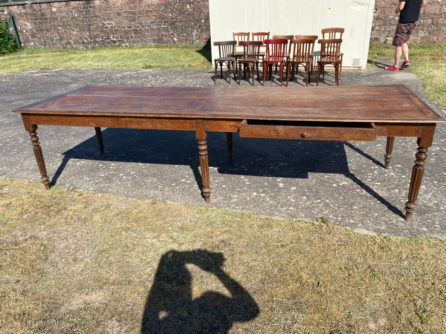 Draper table and its 10 chairs