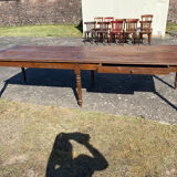 Draper table and its 10 chairs