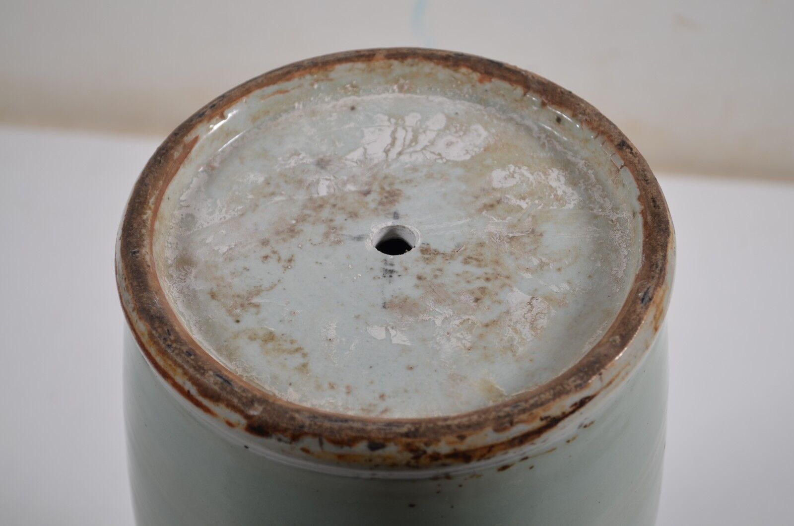 China. Porcelain mallet vase with blue and white phoenix decoration on a rock.