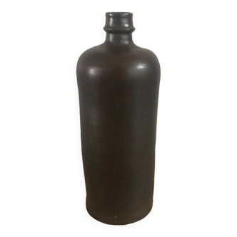 Old handmade terracotta bottle