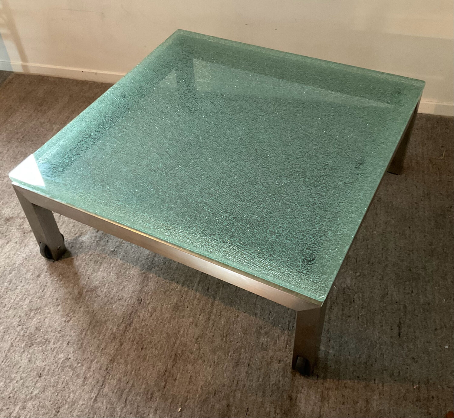 Designer garden coffee table in tempered glass and stainless steel