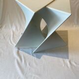 Pair of unmarked triangular white design stools